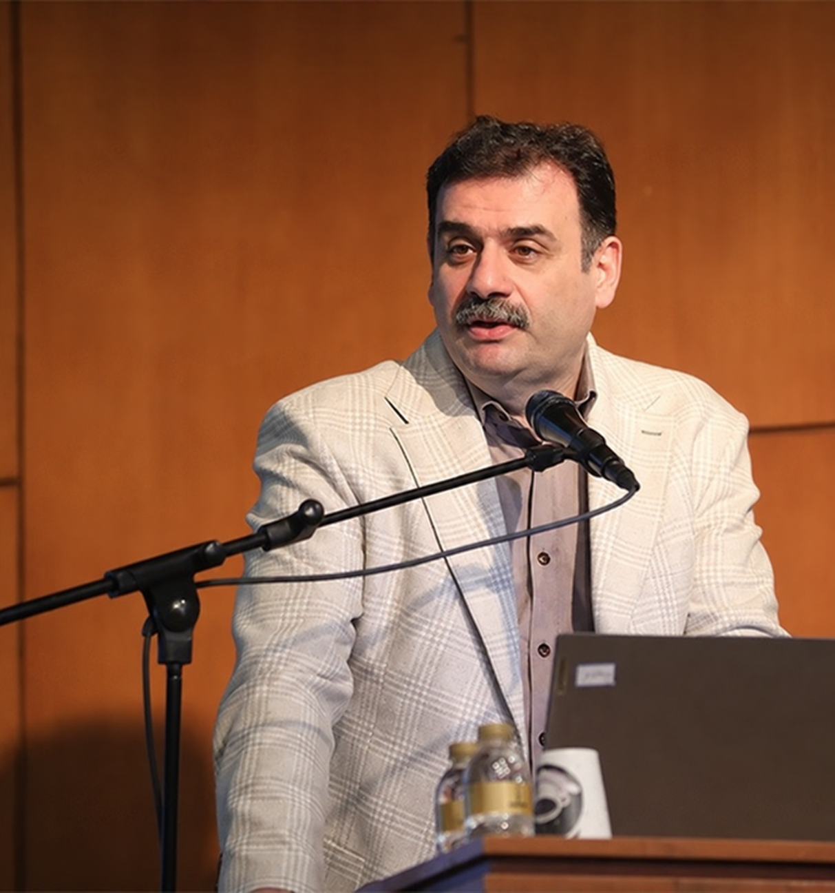 Dr Mohammad Baghaei speaking at a conference